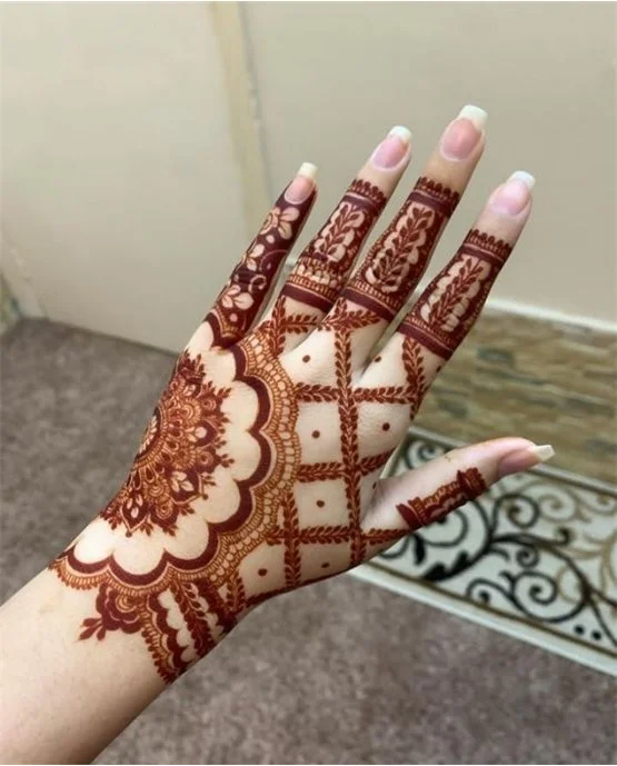 Classy Crescent And Bloom Along Back Hand Mehndi Design